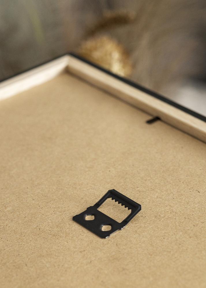 Raam Stilren must tamm 70x100 cm - paspartuu valge 24x36 tolli